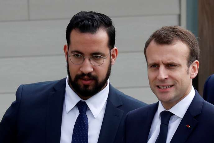 FILE PHOTO: French President Emmanuel Macron and Elysee senior security officer Alexandre Benalla arrive at an elementary school to attend a one-hour interview with French news channel TF1, in Berd'huis